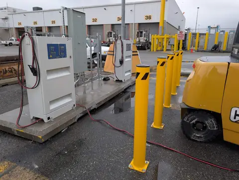 Stanbury outdoor cabinets beside protective bollards